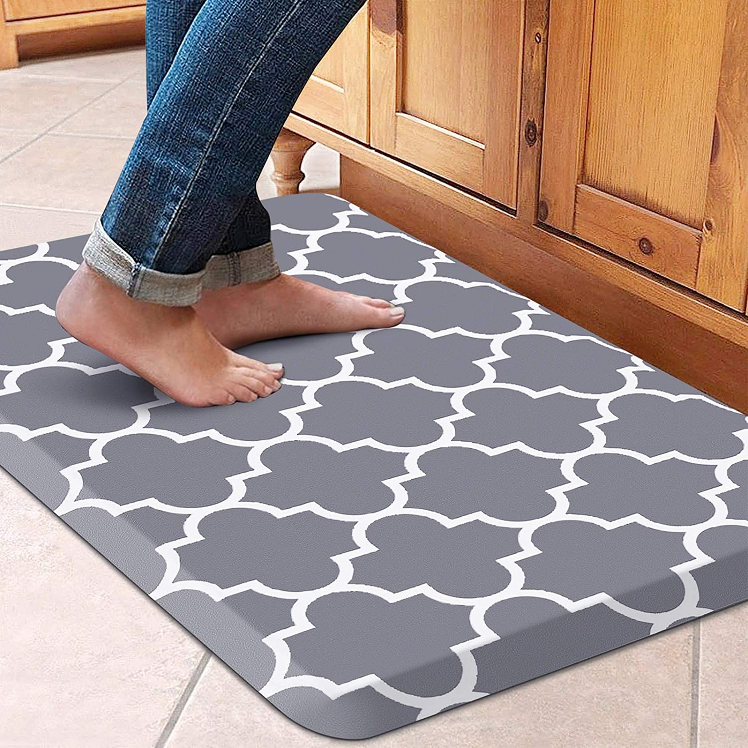 WISElife Kitchen Mat Anti Fatigue for back pain - woman standing on grey kitchen rug with white pattern